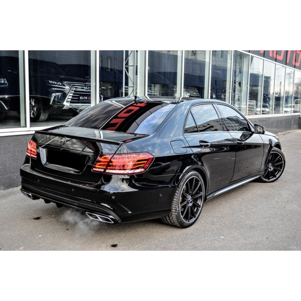 Бампер задний Mercedes E-Class W212 (2014-2016) в стиле AMG E63 под PDC